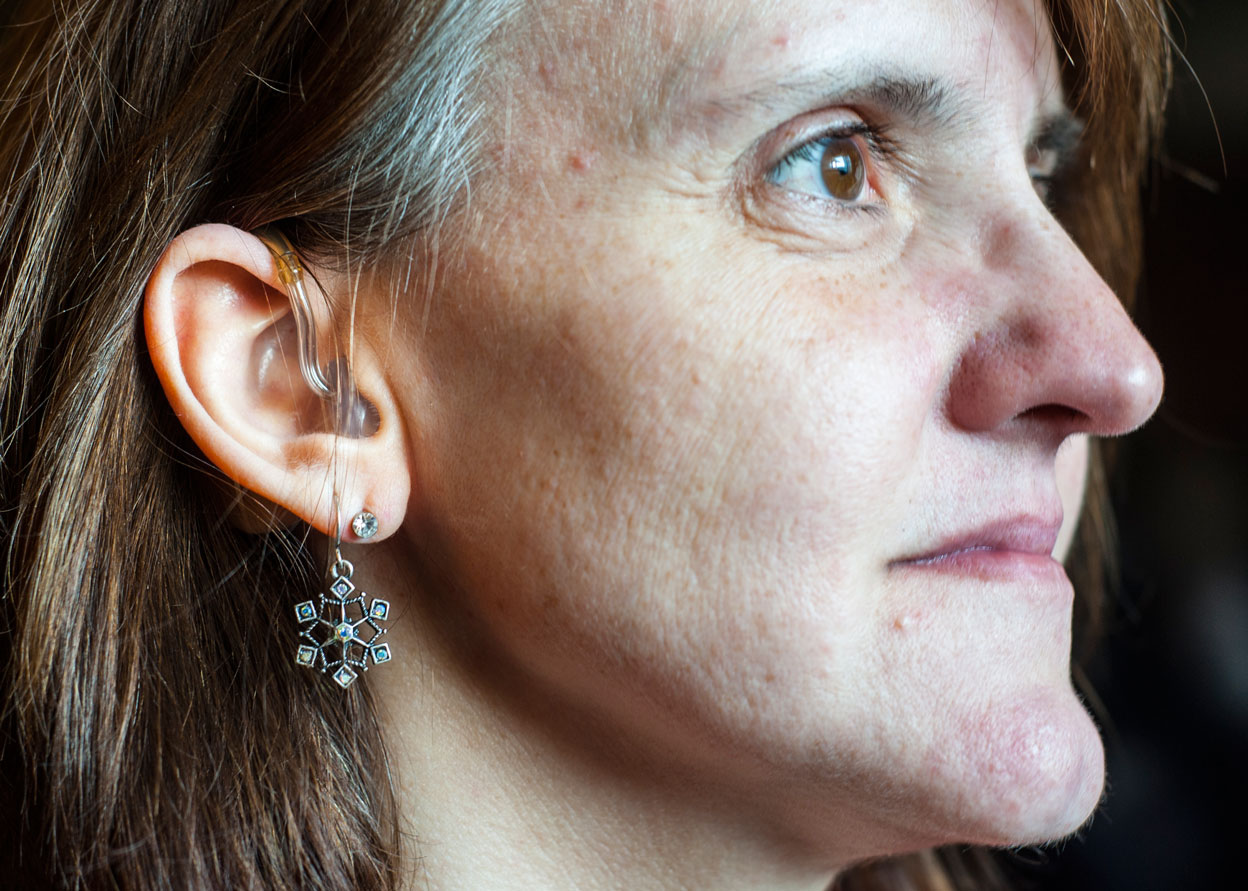 Juanita uses a high-powered, behind-the-ear hearing aid from Germany called the Audifon H70 Super D. Hearing aids are very expensive, ranging in cost anywhere from $3,600 to over $7,000.